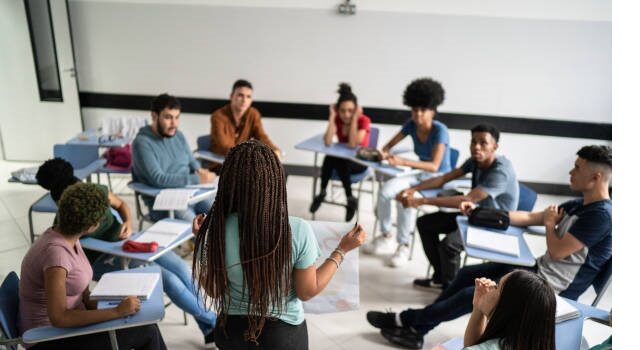 Teenager Student Doing A Presentation In The Classroom